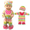 A doll outfit set featuring a colorful floral print jumpsuit and matching hat.