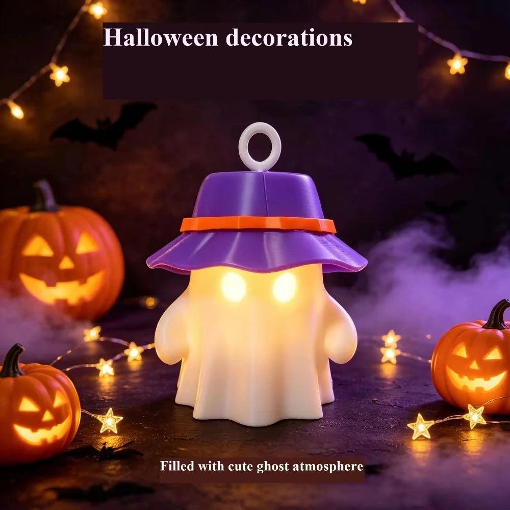 A white ghost night light with a purple hat sits on a dark surface surrounded by glowing stars and pumpkins.