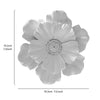 A large, light gray flower-shaped resin wall art piece shown from above.
