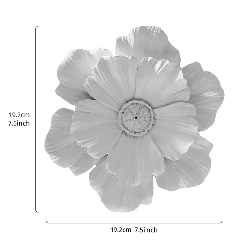 A large, light gray flower-shaped resin wall art piece shown from above.