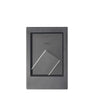 A rectangular, dark gray mini film frame with a slanted viewing window.