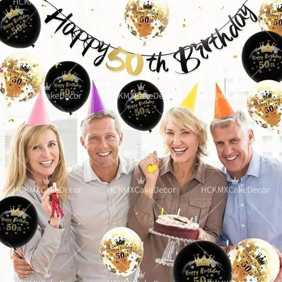 A family celebrating a 50th birthday with a black and gold glitter banner featuring balloons and cake.