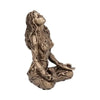 A bronze statue of a female figure with long flowing hair looking upwards, representing Mother Earth Gaia.