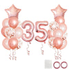 A collection of rose gold foil balloons, including a number 35 balloon and various pink and gold balloons for birthday decor.
