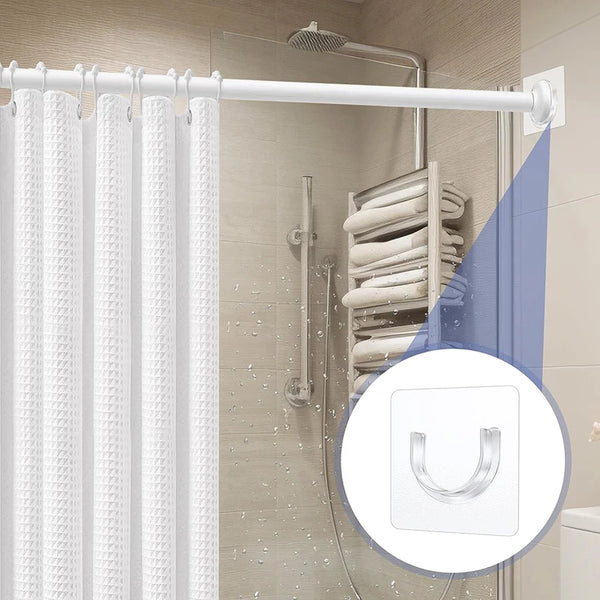 A white curtain rod with a shower curtain and a hand-held showerhead are installed in a bathroom shower area.