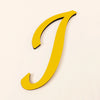 A yellow 3D acrylic letter J wall sticker against a light background.