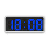 A digital alarm clock displaying 18:00 in bright blue LED numbers on a black background.