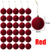 A set of 30 deep red velvet flocked Christmas ball ornaments, showing various sizes and a scale.