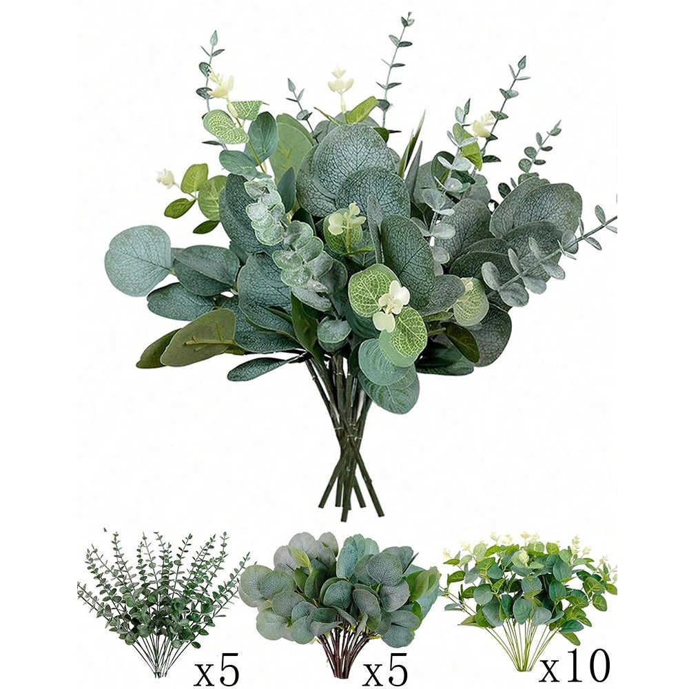 A bouquet of artificial eucalyptus leaves in various shades of green and white.