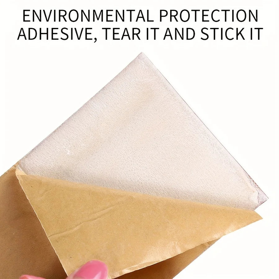 A triangular piece of beige foam adhesive is shown layered over a brown paper envelope.