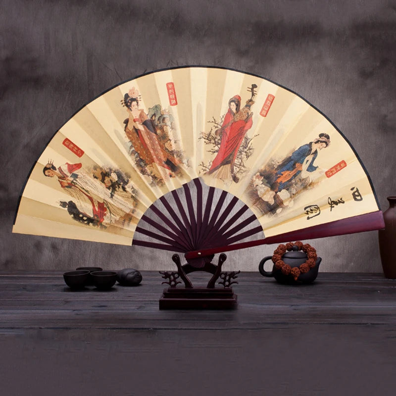 A retro folding silk and bamboo decorative fan with painted scenes of historical figures and landscapes.