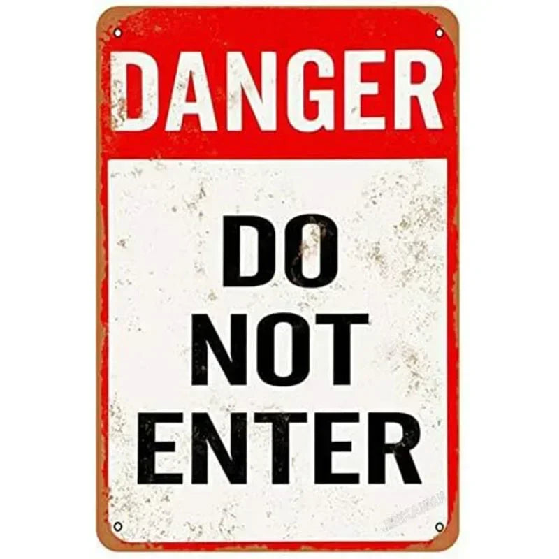 Vintage red and white sign with black text that reads DANGER DO NOT ENTER