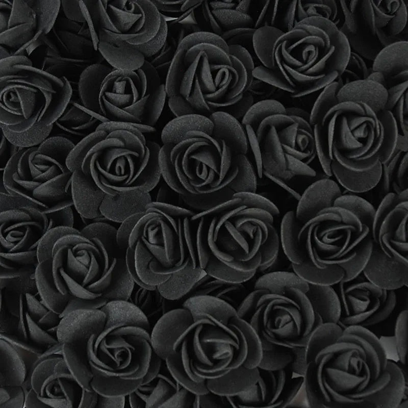 A bulk pack of realistic black foam rose flowers for weddings and events.