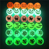 A set of ten glow-in-the-dark Halloween bouncing balls featuring various spooky faces and creatures.