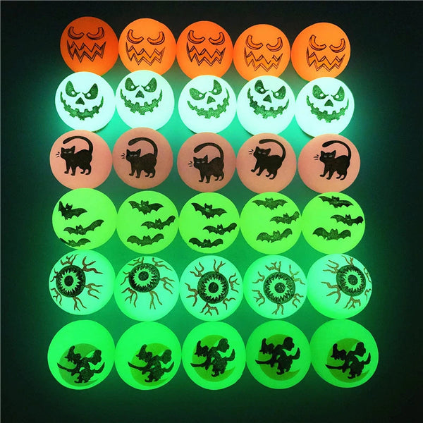 A set of ten glow-in-the-dark Halloween bouncing balls featuring various spooky faces and creatures.