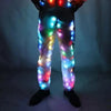 A person wearing a light-up neon costume set with colorful LED lights on the jacket and pants.