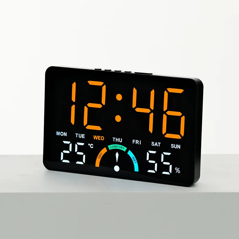 A black digital alarm clock displaying the time 12:46, temperature, and humidity percentage.