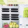 A display of black plastic food storage containers with lids stacked in a refrigerator