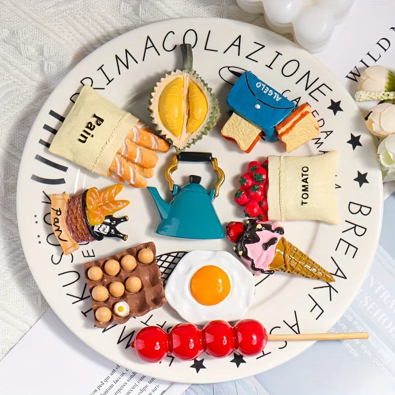 A plate featuring various food items like cheese, fruit, bread, and egg arranged for a 3D resin food magnets set.