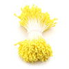 A bundle of bright yellow mini artificial flower stamens used for DIY decoration.