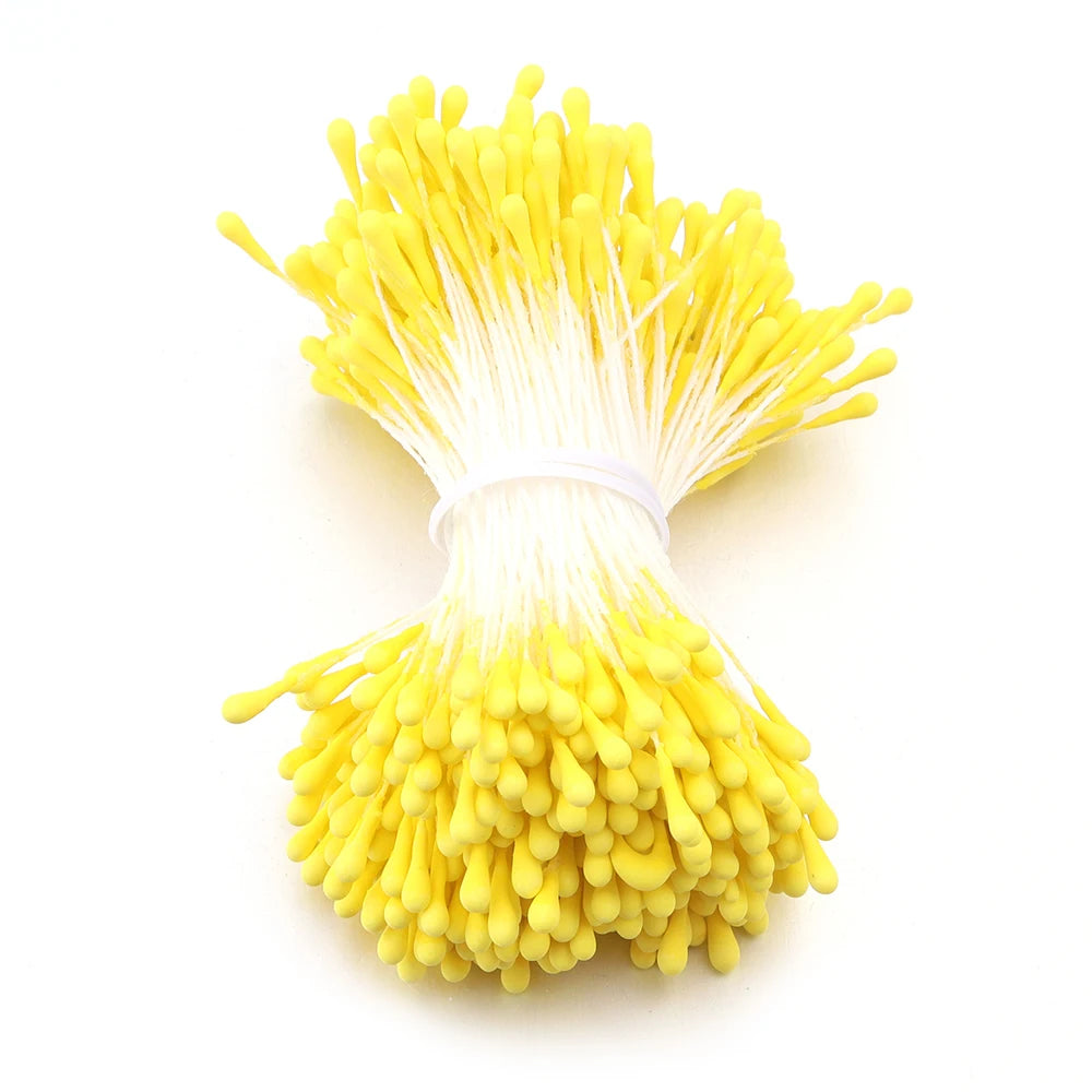 A bundle of bright yellow mini artificial flower stamens used for DIY decoration.