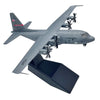 A gray 1:200 scale diecast model of a U.S. Air Force C-130 Hercules aircraft in flight.