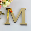 A set of three 3D golden letter mirror wall decals, M, displayed against a white background.