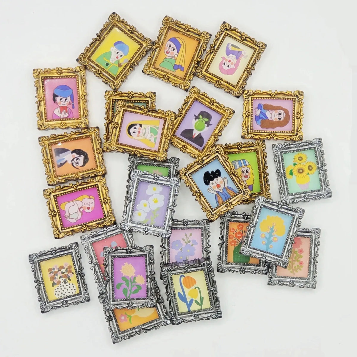 A collection of miniature framed wall art featuring colorful illustrations and floral designs.