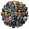 A collection of colorful skull and joker themed decals and stickers.