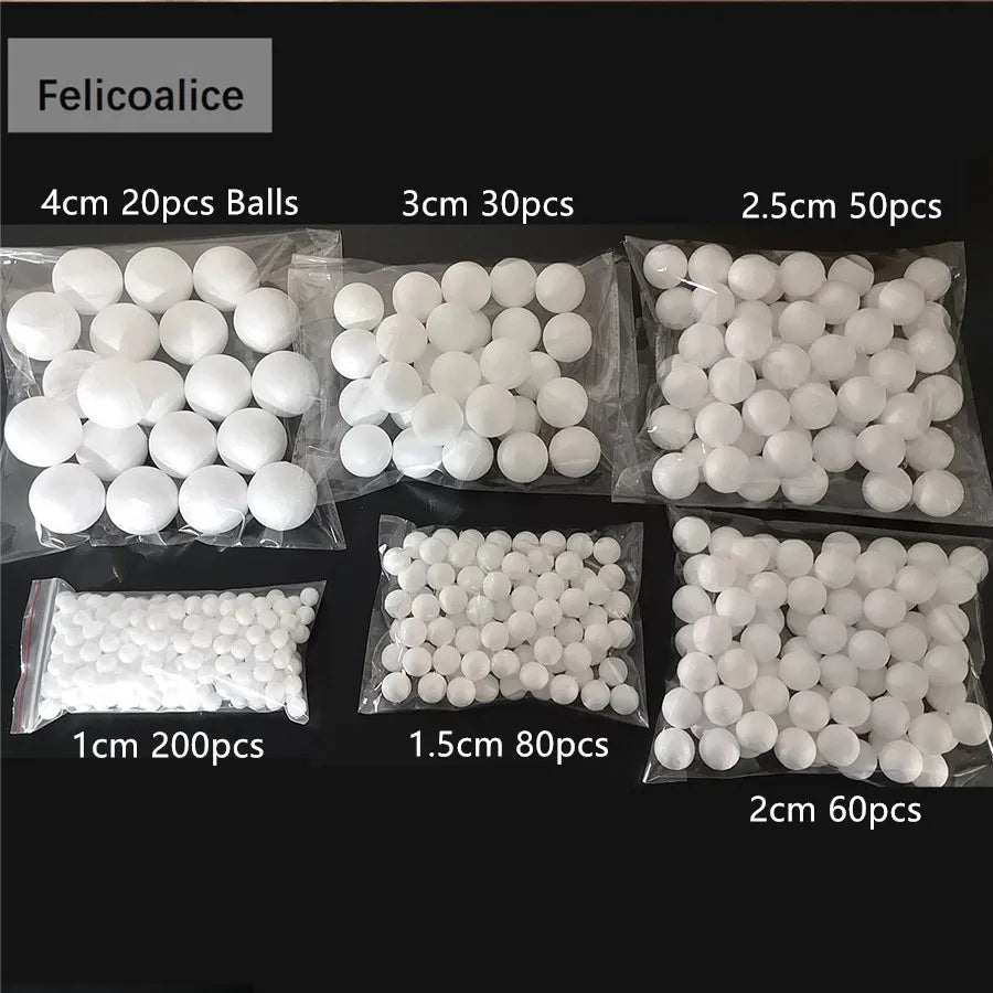 Assortment of white polystyrene foam balls in various sizes and quantities for crafting