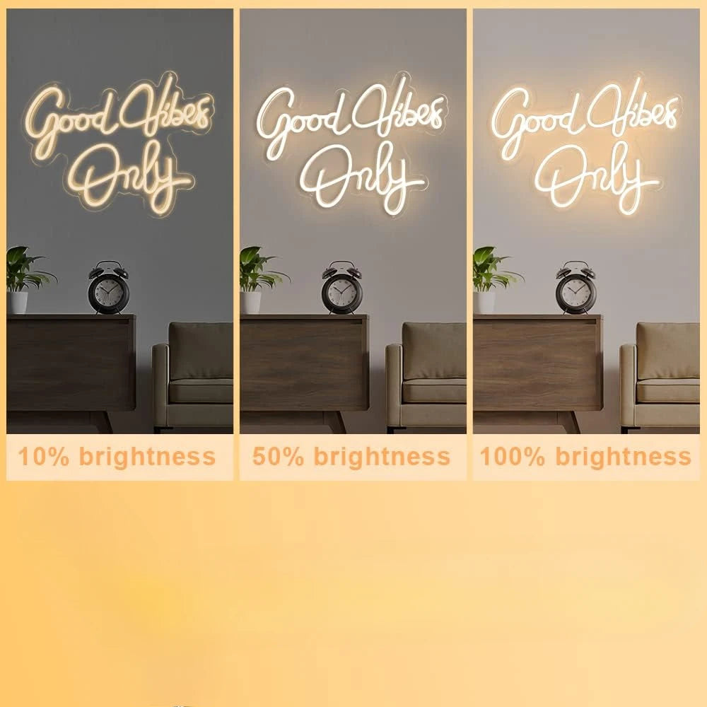 Three versions of a glowing neon sign displaying Good Vibes Only in different brightness levels