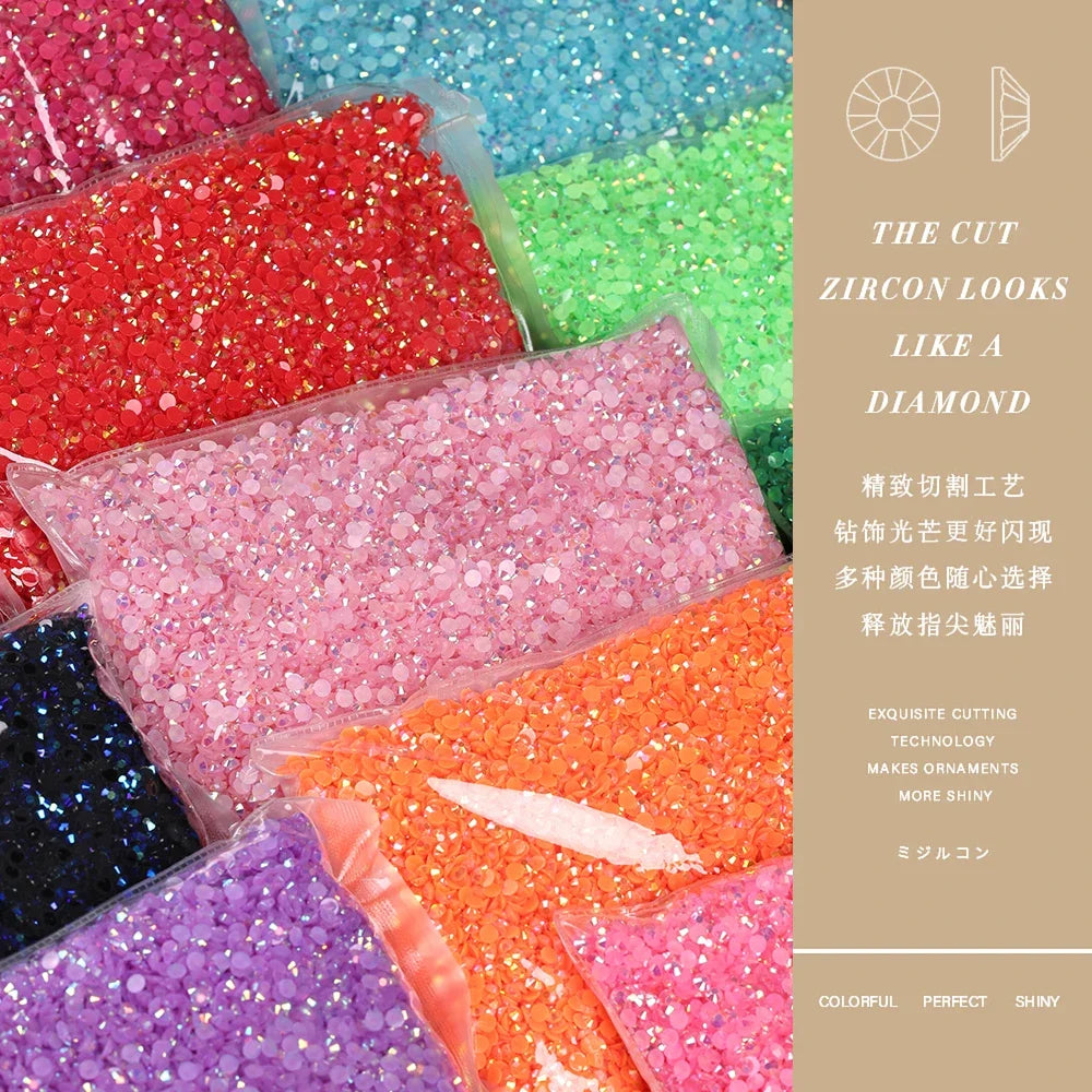 Assortment of colorful resin rhinestones and glitter for crafting projects