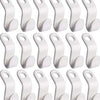 A set of white space-saving cascading hanger connector hooks for wardrobe organization.