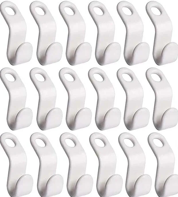 A set of white space-saving cascading hanger connector hooks for wardrobe organization.