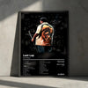 A framed poster featuring the album art and tracklist for Last Lap by Rod Wave, displayed on a gray wall.