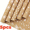 Five rolls of brown wrapping paper featuring white deer and snowflake patterns for Christmas