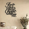 Black script wall art featuring the verse "Fan Do All Things Through Christ That Strengthens Me" on a beige wall.