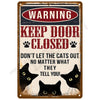 A vintage tin sign with a warning to keep the door closed and not let cats out.