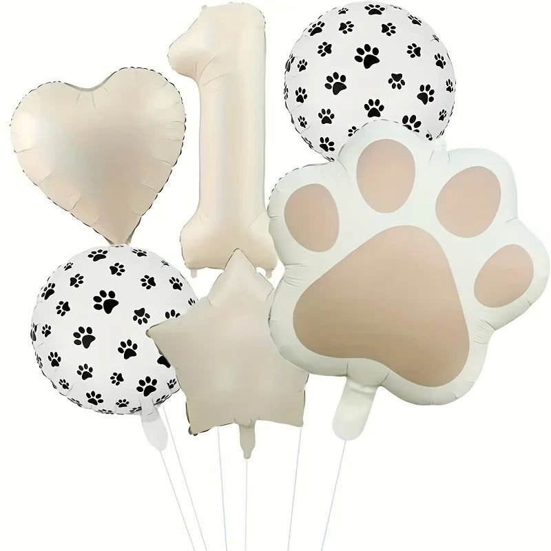 A set of six foil balloons featuring paw prints and the number one in beige and white.
