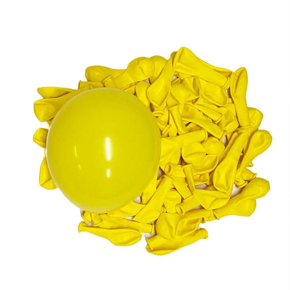 A pile of bright yellow latex balloons.
