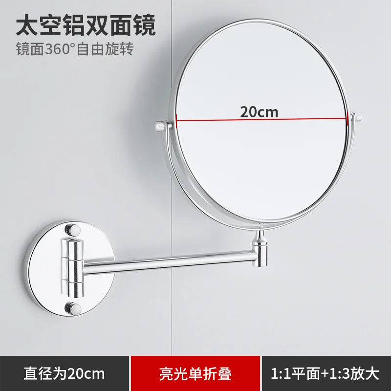 A round, silver-framed folding double-sided wall mirror with a 20cm diameter and telescopic arms.