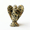Hand-carved angel crystal figurine with a speckled, translucent appearance.