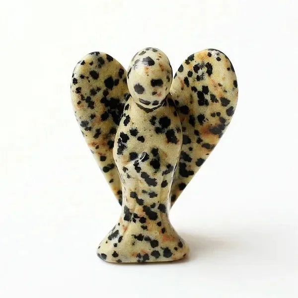 Hand-carved angel crystal figurine with a speckled, translucent appearance.