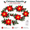 A red poinsettia LED garland with warm lights for holiday decor