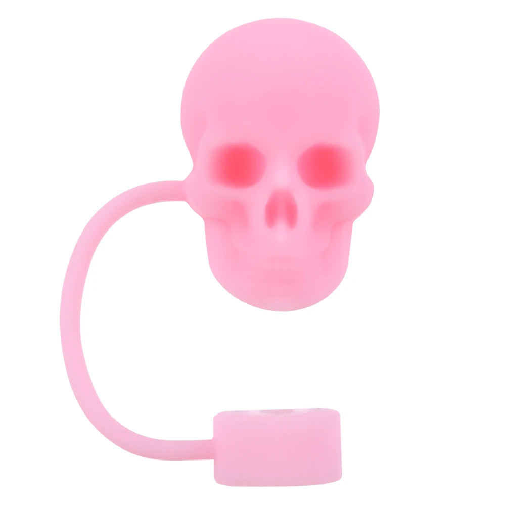 A pink silicone straw cover shaped like a skull.