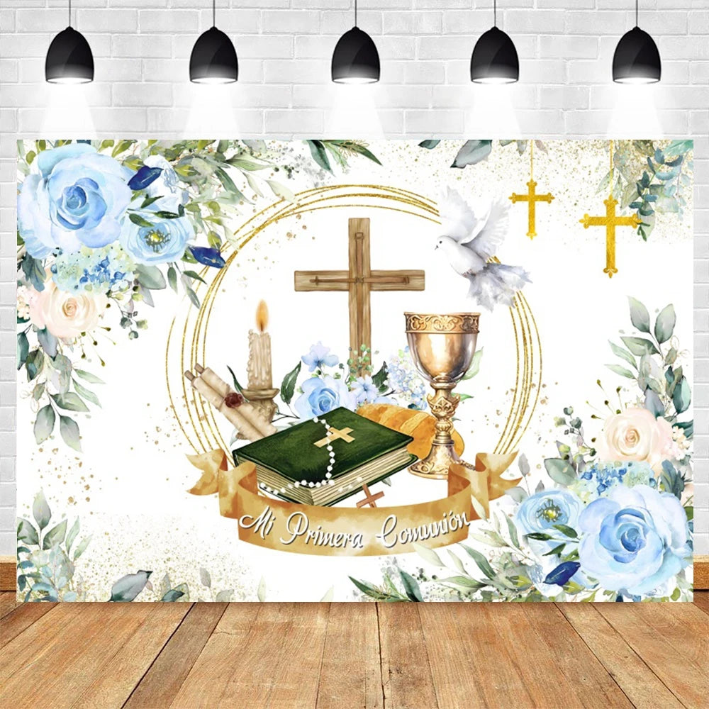 A faith-themed backdrop featuring gold accents, greenery, blue roses, and a wooden cross for baptism or communion celebration