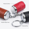 A red textured surface mini coin holder keychain with a silver finish and sturdy key ring.