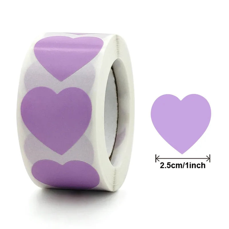 Roll of purple heart-shaped seal stickers for crafting and packaging with a size reference.