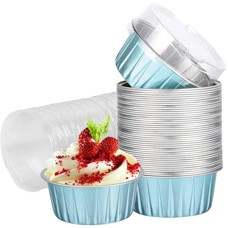 Stack of reusable aluminum foil dessert ramekins with lids in silver and blue tones