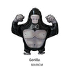 A black inflatable gorilla decoration with a menacing face and muscular arms.